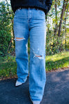 Risen High Rise Wide Leg Distressed Jeans