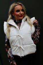 Flutter Sleeve Bow Detail Puffer Vest | Cream