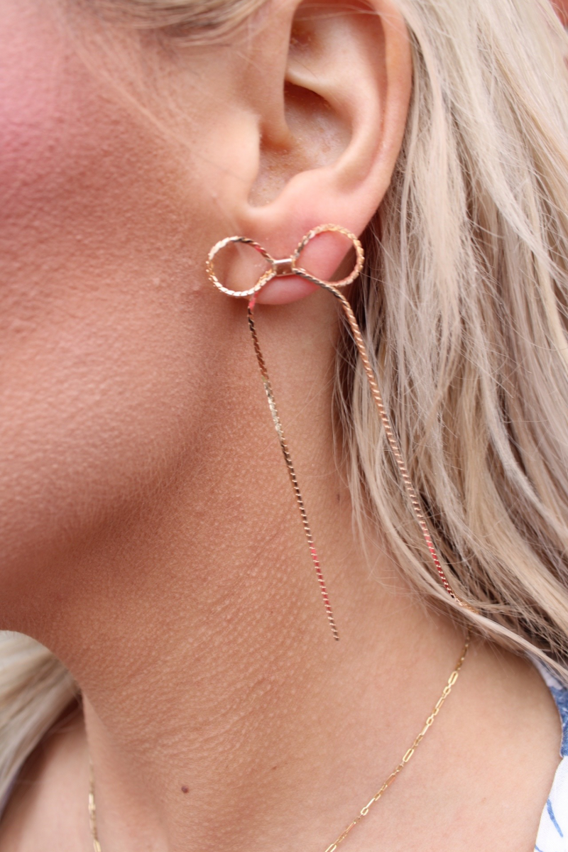 Metal Bow Dangle Earrings: Gold